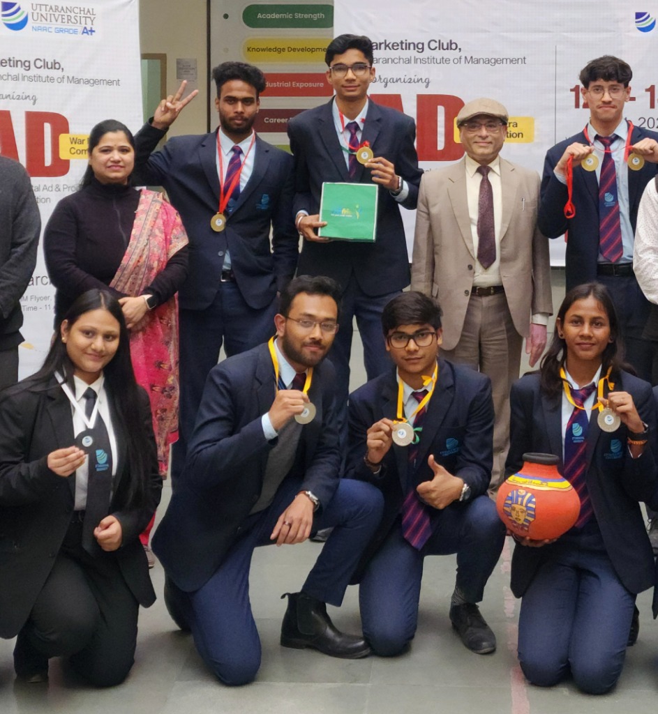 Celebrating 2nd prize victory with team members at Uttaranchal University.